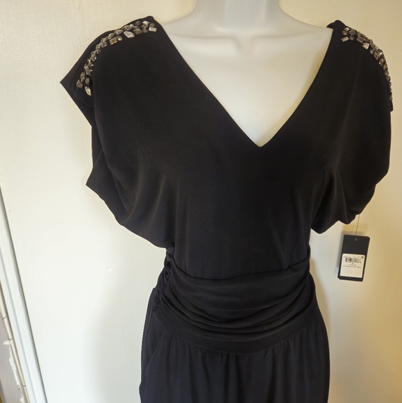 New..Guess jumpsuit, size small..black color..for small waist girls. - Picture 2 of 6